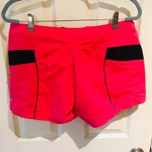 Nike pink and black shorts, size medium, gently used condition.